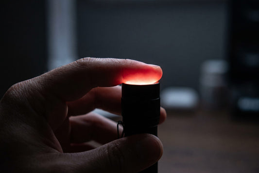 Why your finger glows red under a flashlight